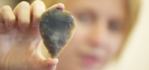 Student with flint fragment