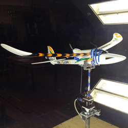 Unmanned air vehicle with flow sensors in wing in wind tunnel