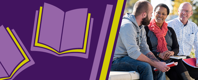 Three mature students sitting outside on a wall at the University campus. They are smiling and chatting, and holding books. 