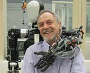 Professor Chris Melhuish with one of the BRL robots