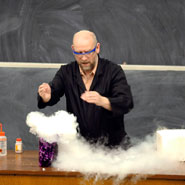 Tim Harrison giving chemistry lecture demonstration 'A Pollutants Tale'.