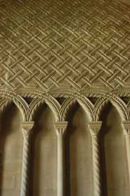 The twelfth-century Chapter House has walls so covered in carved patterns that they look more like a tapestry than a building