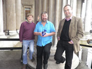 Directors of the Bluestonehenge project (from left) Dr Joshua Pollard, Professor Mike Parker Pearson (Sheffield) and Professor Julian Thomas (Manchester), with their trophy outside the British Museum