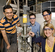 Left to right: Azmi Mohamed, Stephen Cummings and Masanubo Sagisaka ( all University of Bristol) with instrument scientist Dr Sarah Rogers (ISIS), with the sample pressure.