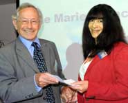 Dr Lindsay St Claire receiving her award from Sir Stephen Sedley, BTA President