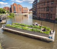 The Floating Ballast Seed Garden moored at Castle Park