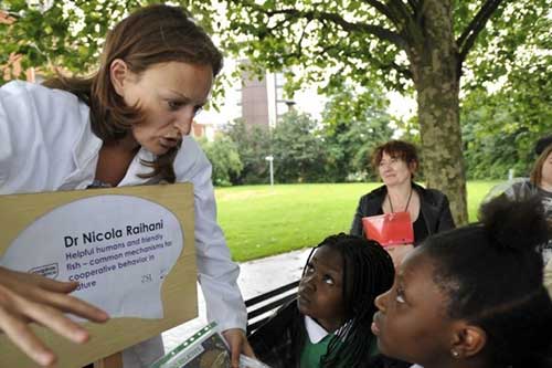 Image of a scientist talking at a previous Soapbox Science event