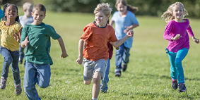 Kids running in a field