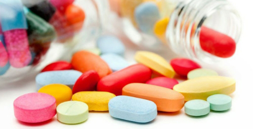 jar of multicoloured tablets