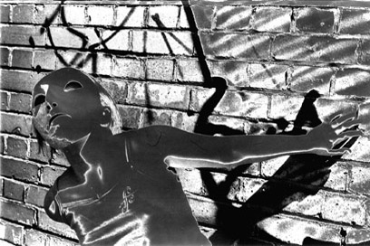 photograph: polarised, masked figure