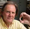 Professor Terence Cosgrove with a sample of Clean Gum 