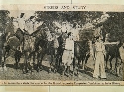 Competitors study the course