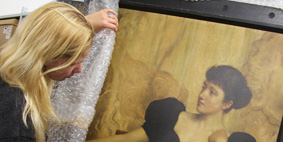 Student looking at a painting