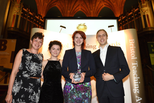Three presenters for the Students' Award for Outstanding Teaching in the category of Science present the award to Dr. Rose Murray.