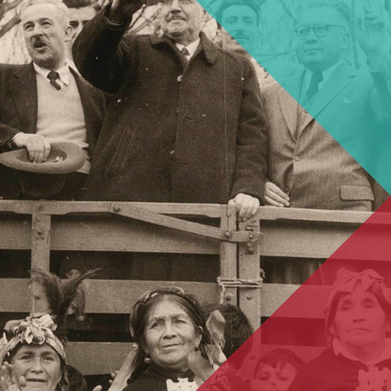 A sepia photograph of Chilean male politicians stood on a platform with a small crowd of indigenous Chilean women and children underneath