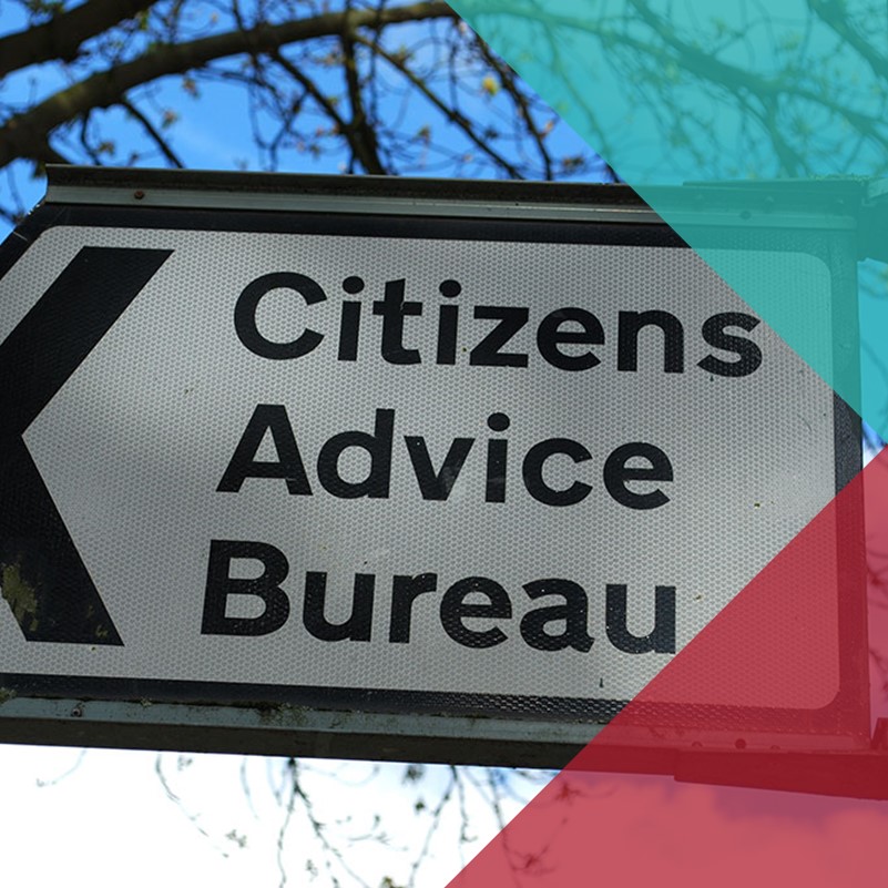 A photograph of a road sign pointing towards 'Citizens Advice Bureau'