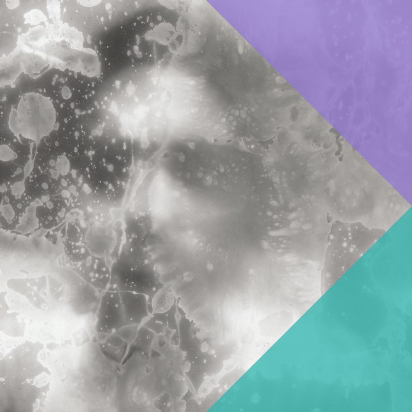 a obscured old photograph of a face