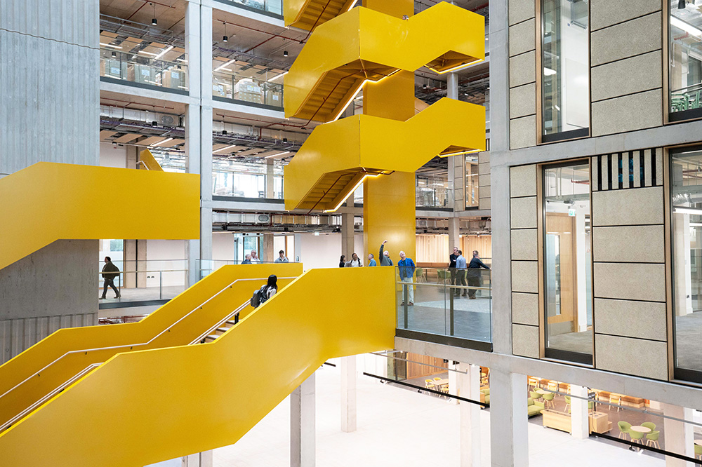 TQEC yellow staircase in atrium