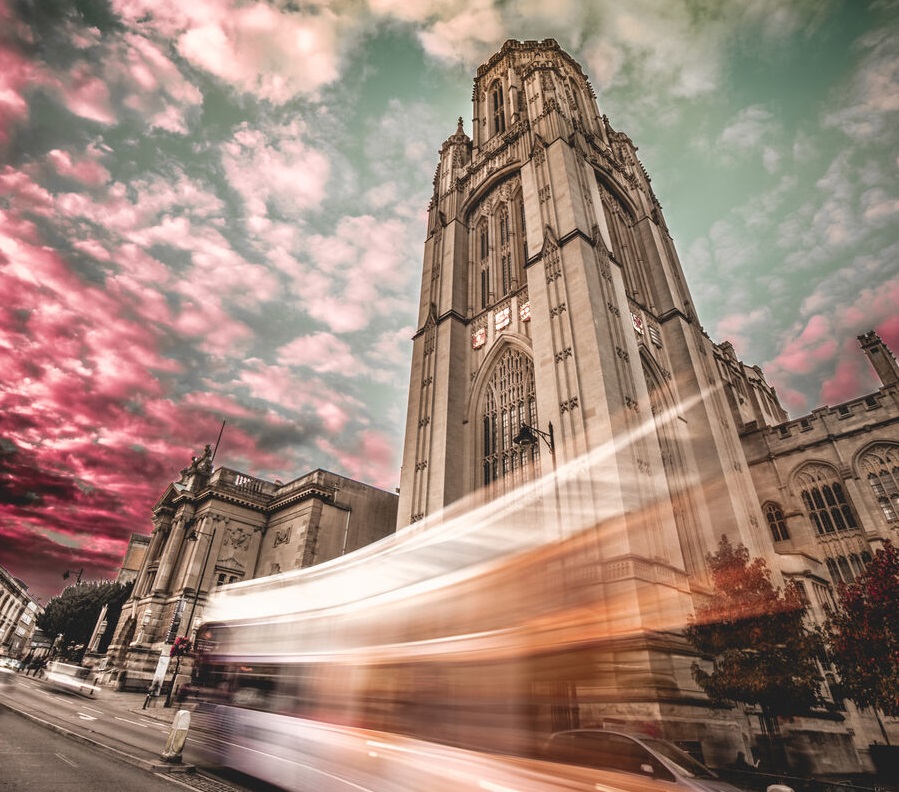 Will's memorial building with traffic rushing past