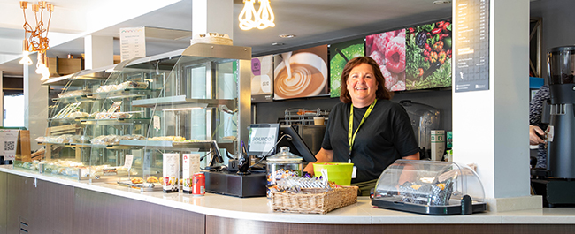 Image of staff behind counter at Churchill Cafe.