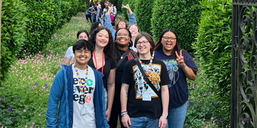 Group of students smiling for the camera.