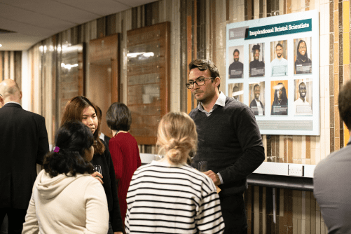 Photo of 2023 celebrant Rafael chatting with some of the attendees of the Inspirational Bristol Scientists celebration.