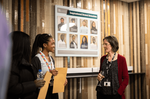 Photo of 2023 celebrants Sbu and Stefania chatting to attendees of the Inspirational Bristol Scientists celebration.