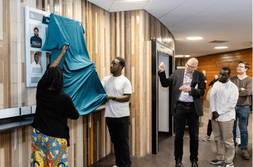 Photo of Lara and Shaun unveiling the 2023 Inspirational Bristol Scientists board. 