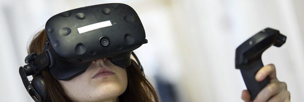 A student using virtual reality equipment