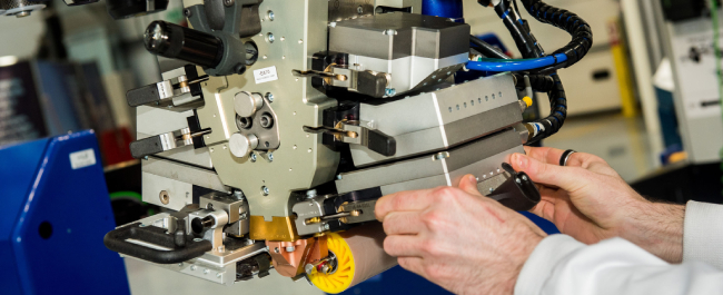 Close up of hand using engineering equipment