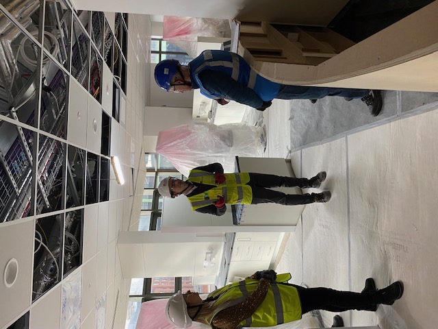 Group of visitors on a tour at the new location in February 2023