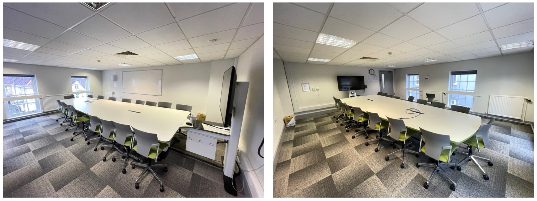 Chairs placed around a large collaboration table.