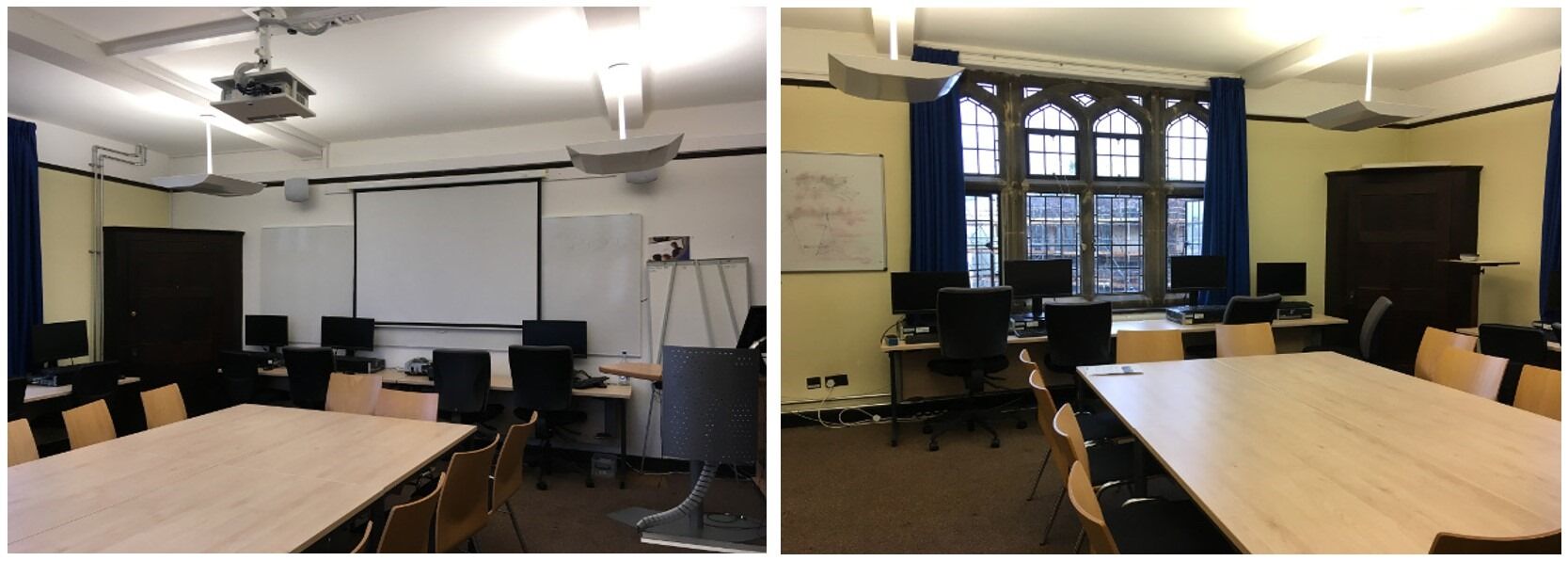 Chairs and tables set up in the middle of the room in boardroom style, with PC desks around the walls.