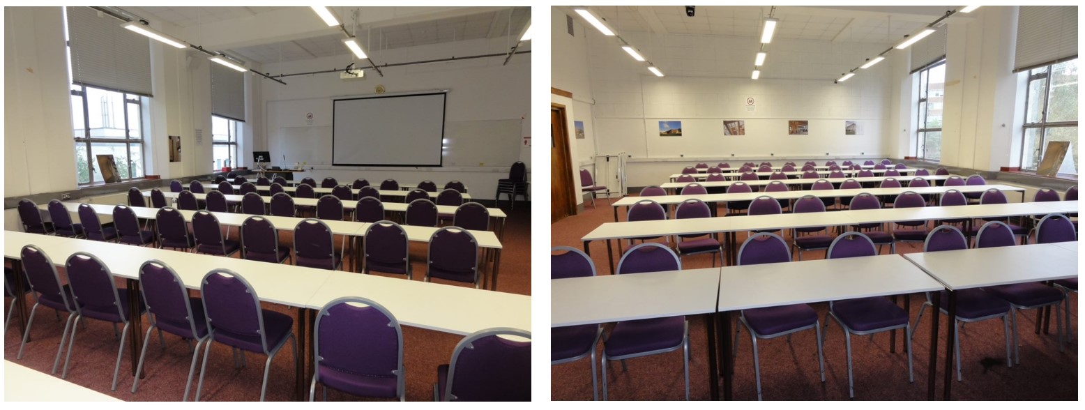 Rows of chairs and tables facing the teaching wall.