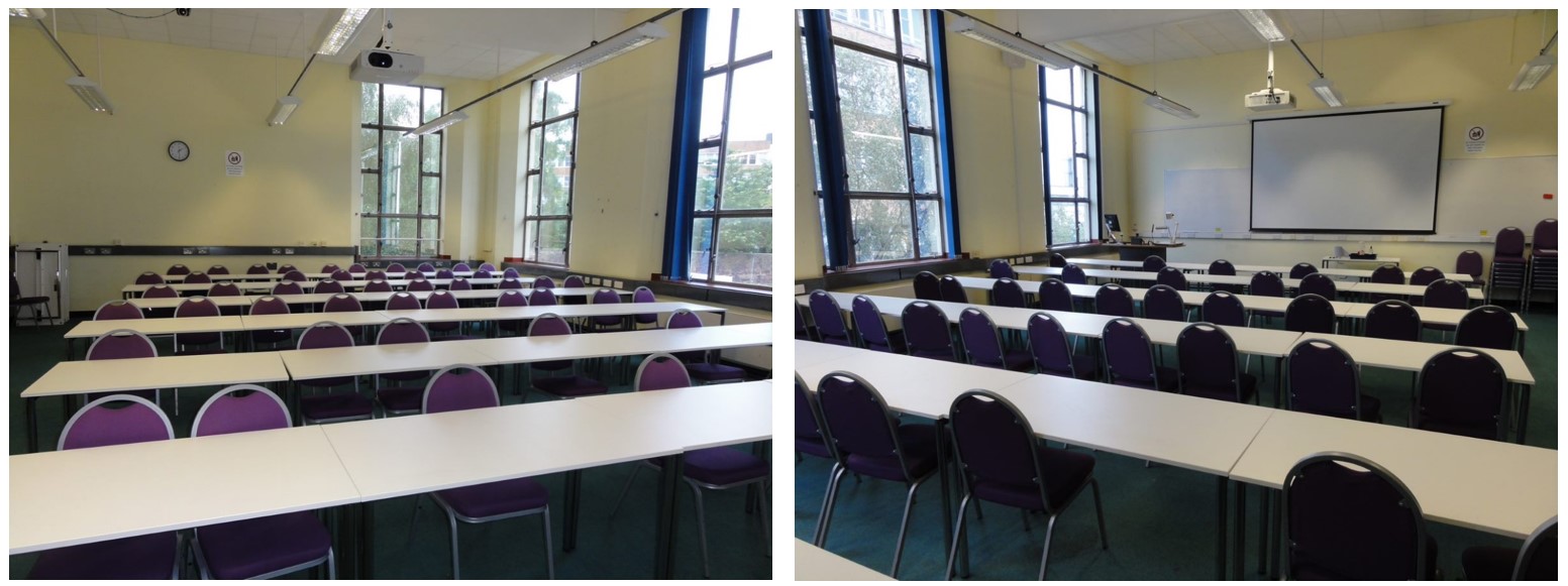 Rows of chairs and tables facing the teaching wall.