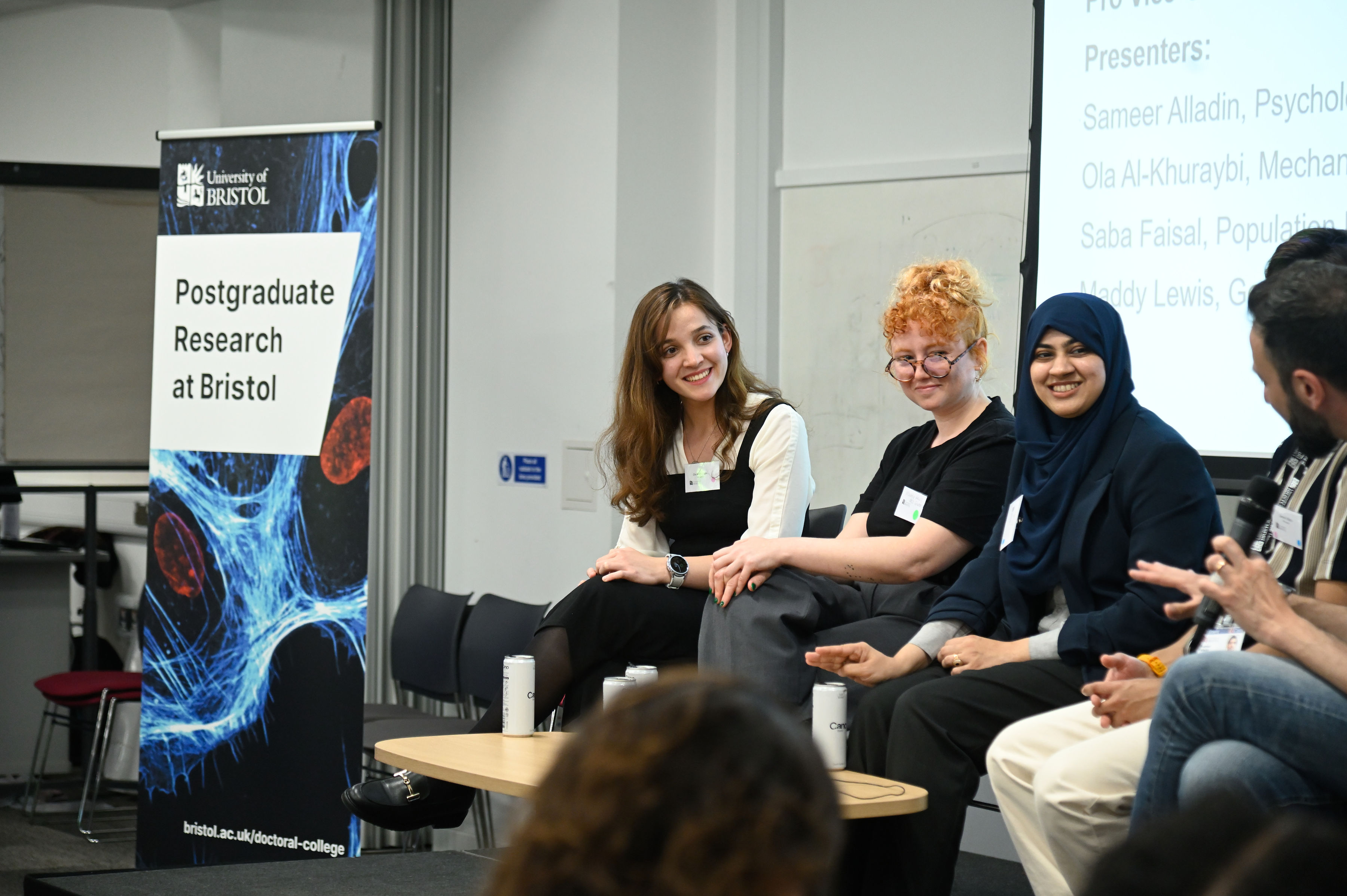 Panel of postgraduate researchers at scholarship event