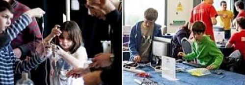 School age children working with electronics and computers