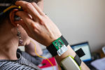 Person wearing monitoring wristband