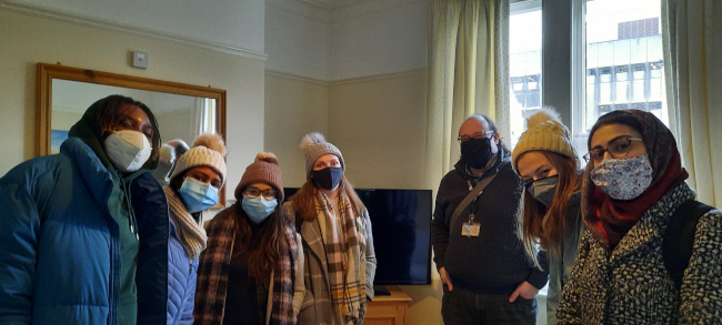 Group of CDT students in the front room of the SPHERE house (650px wide)