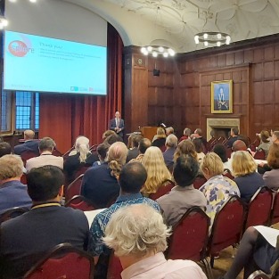 Prof Ian Craddock addresses an audience at SPHERE's ten-year celebration.