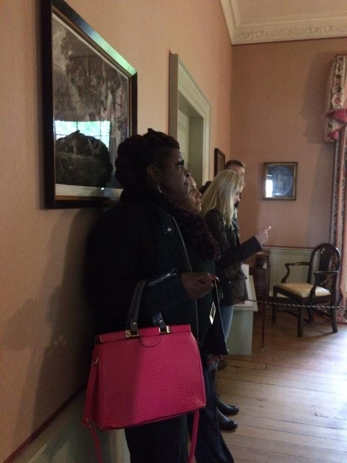 Photo of audience listening inside Georgian House