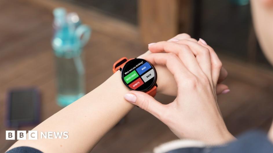 A photo of a smartwatch, with a popup asking what the person has been drinking, as presented by BBC news