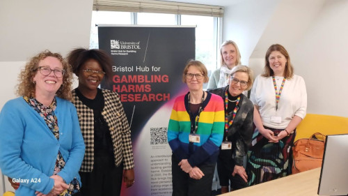 Professor Raburu meeting staff at the Bristol Hub for Gambling Harms Research