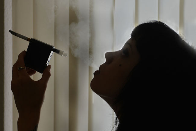 An image of someone smoking