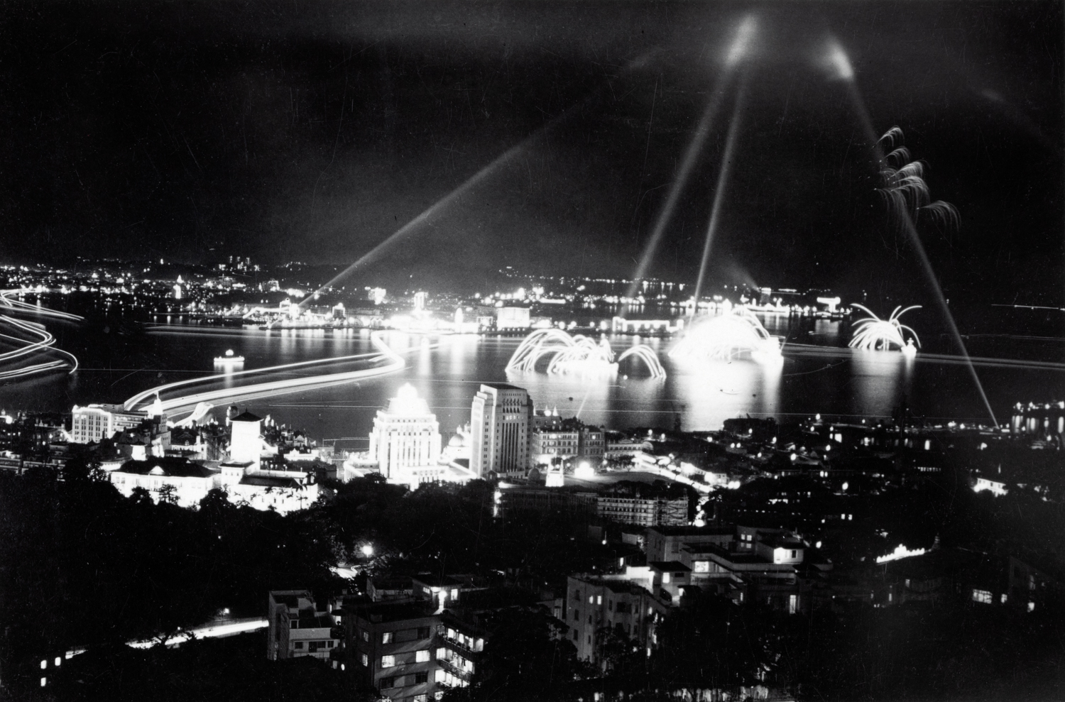 A night view of fireworks above Victoria Harbour.