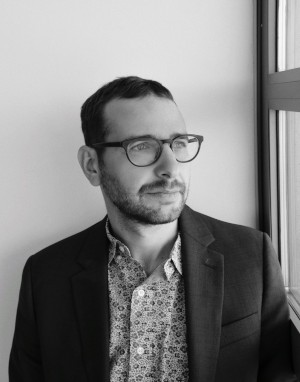 A black and white image of Adam Roberts