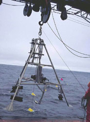 The lander being lowered into the sea.