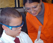 A pupil from Robinswood Primary School gets close to chemistry with the help of a Science and Engineering Ambassador from Bristol