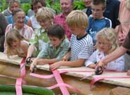 Cutting the ribbon at the opening of the Tropical Zone