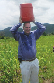 Stephen Gundry carrying water